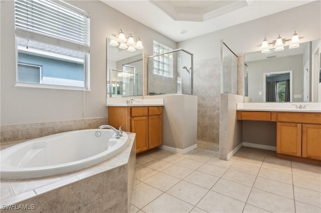 12642 Cara Cara Loop, Bradenton, FL 34212 - full bath featuring walk in shower, a garden tub, two vanities, tile patterned floors, and a tray ceiling