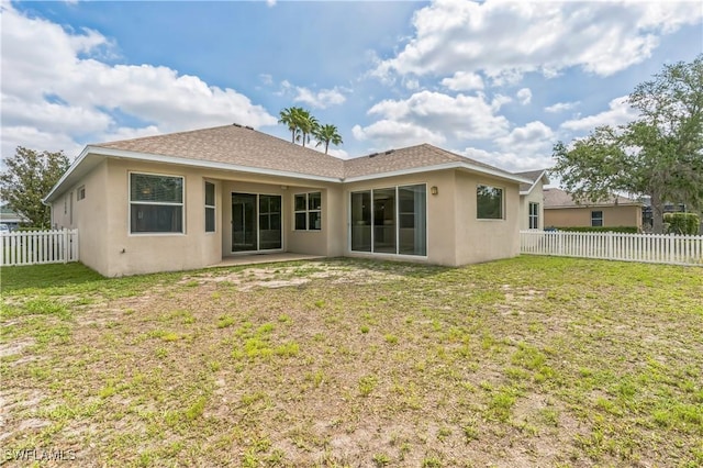 12642 Cara Cara Loop, Bradenton, FL 34212 - rear view of house with stucco siding, a patio, and roof with shingles