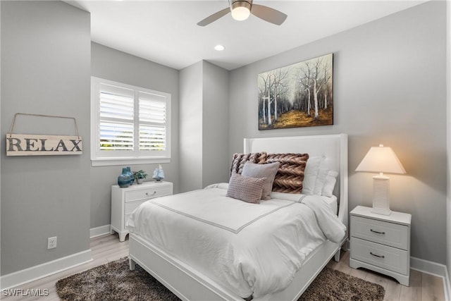 8761 Bellano Ct Unit 202, Naples, FL 34119 - bedroom featuring baseboards, light wood-style floors, ceiling fan, and recessed lighting