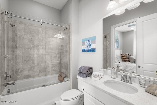 8761 Bellano Ct Unit 202, Naples, FL 34119 - ensuite bathroom with vanity,  shower combination, and toilet