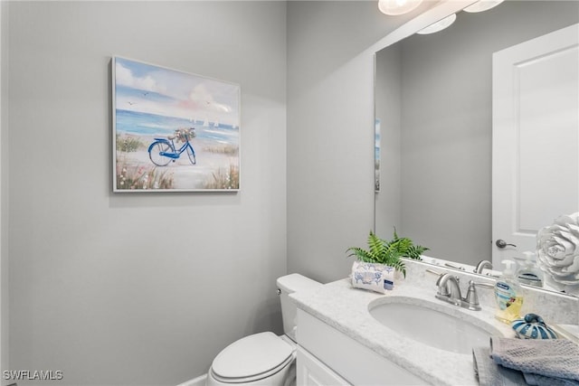 8761 Bellano Ct Unit 202, Naples, FL 34119 - bathroom with vanity and toilet
