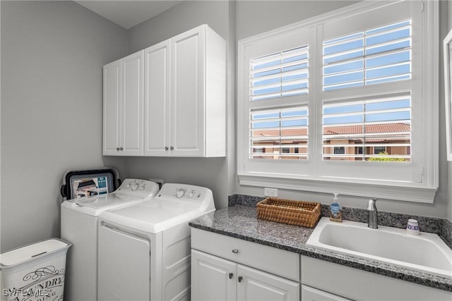 8761 Bellano Ct Unit 202, Naples, FL 34119 - laundry room featuring cabinet space and separate washer and dryer
