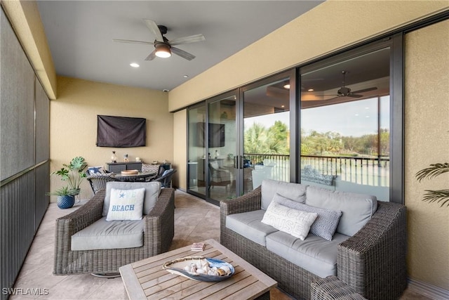8761 Bellano Ct Unit 202, Naples, FL 34119 - sunroom / solarium with a ceiling fan and outdoor dining space