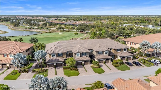 8761 Bellano Ct Unit 202, Naples, FL 34119 - aerial perspective of suburban area with a local golf course and a large body of water