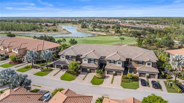 8761 Bellano Ct Unit 202, Naples, FL 34119 - aerial view of residential area with a large body of water and a local golf course