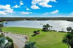 8761 Bellano Ct Unit 202, Naples, FL 34119 - water view with a golf course