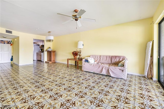 4900 Biscayne Dr Unit 14, Naples, FL 34112 - living area with ceiling fan and baseboards