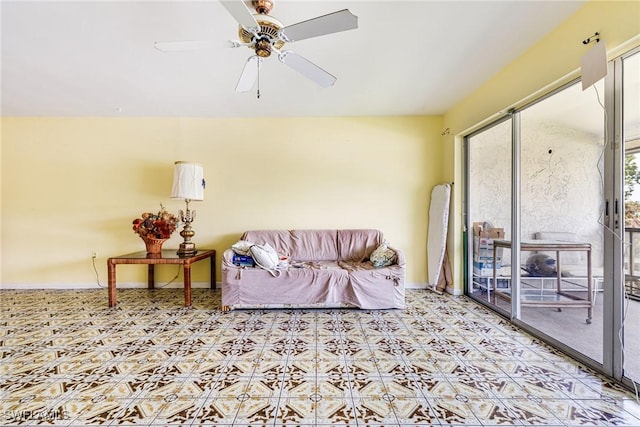 4900 Biscayne Dr Unit 14, Naples, FL 34112 - sitting room with a ceiling fan and baseboards