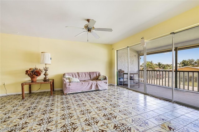 4900 Biscayne Dr Unit 14, Naples, FL 34112 - living area with a ceiling fan and baseboards