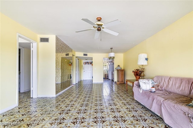 4900 Biscayne Dr Unit 14, Naples, FL 34112 - living room with ceiling fan, baseboards, and tile patterned floors