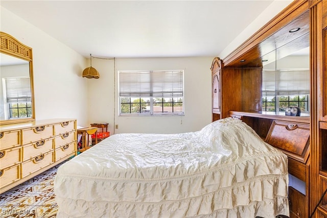 4900 Biscayne Dr Unit 14, Naples, FL 34112 - bedroom featuring multiple windows