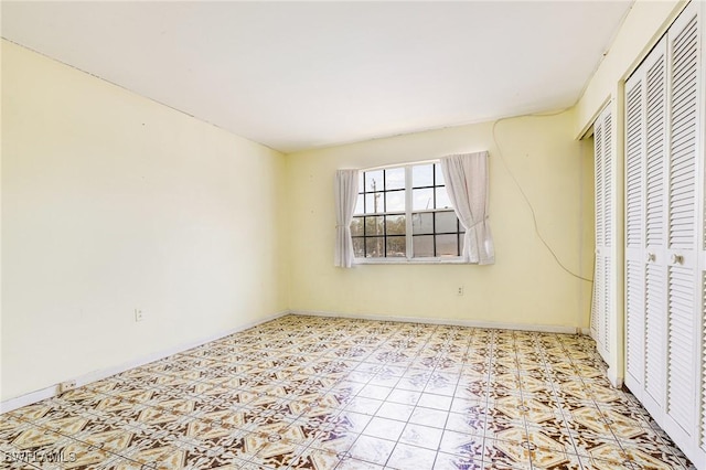 4900 Biscayne Dr Unit 14, Naples, FL 34112 - unfurnished bedroom with baseboards