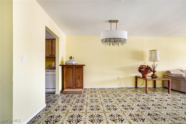 4900 Biscayne Dr Unit 14, Naples, FL 34112 - hallway featuring baseboards and light floors