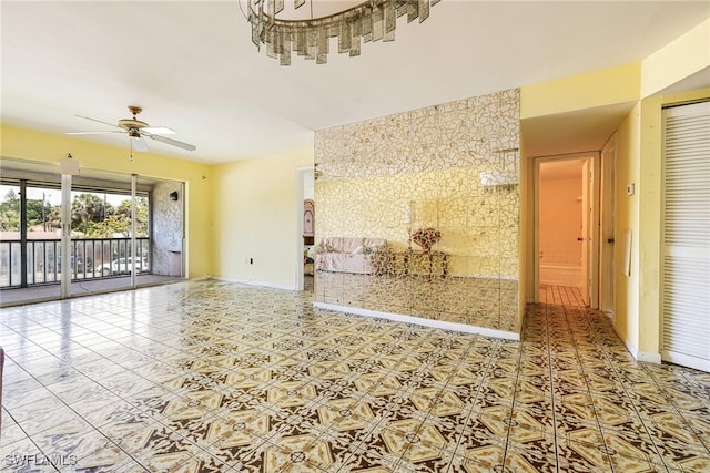 4900 Biscayne Dr Unit 14, Naples, FL 34112 - unfurnished living room with a ceiling fan, baseboards, and tile patterned flooring