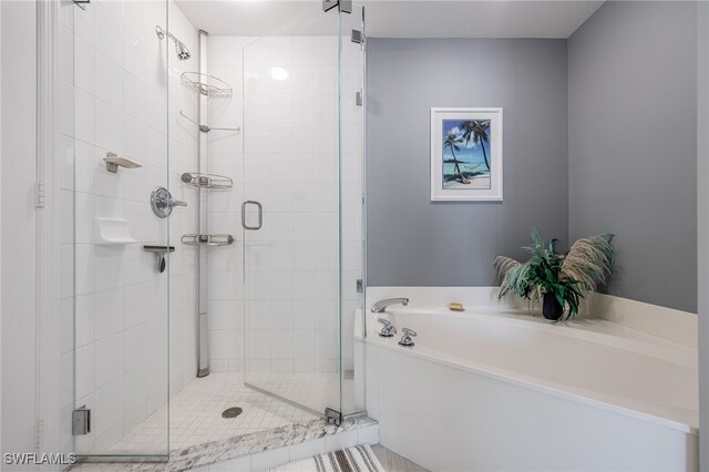 2797 1st St Unit 803, Fort Myers, FL 33916 - full bath with a garden tub and a stall shower