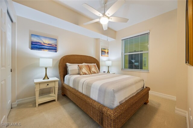 2797 1st St Unit 803, Fort Myers, FL 33916 - bedroom featuring light colored carpet, baseboards, and a ceiling fan