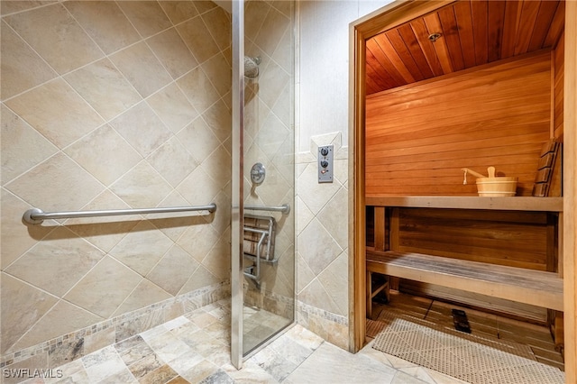 2797 1st St Unit 803, Fort Myers, FL 33916 - full bath with a relaxing sauna, a tile shower, and wooden walls