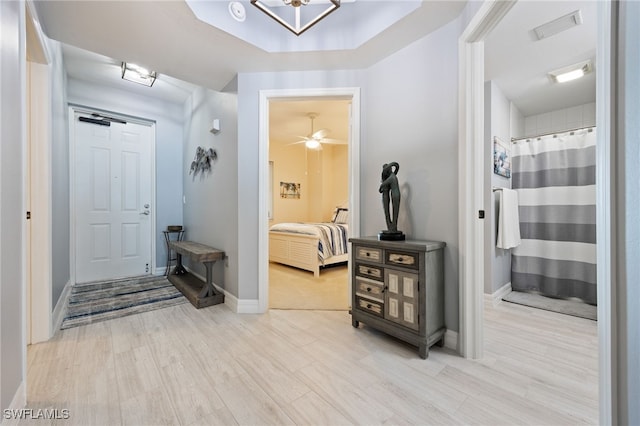 2797 1st St Unit 803, Fort Myers, FL 33916 - entryway with light wood-type flooring and baseboards
