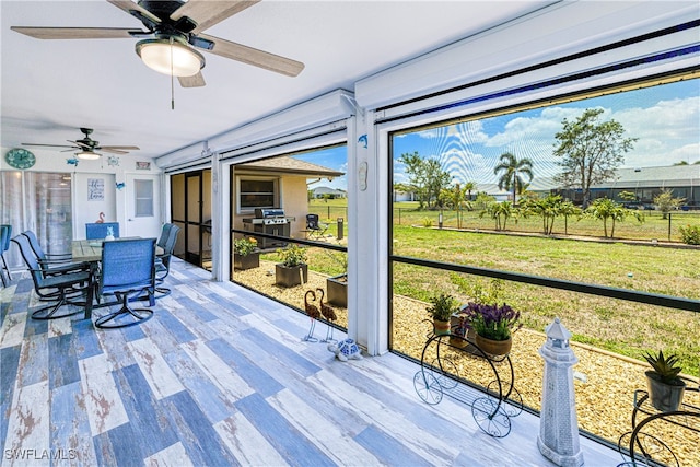 25379 Paladin Ln, Punta Gorda, FL 33983 - sunroom / solarium with ceiling fan and outdoor dining area