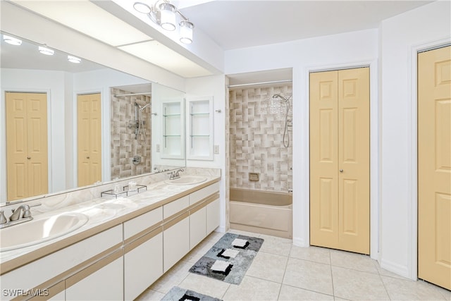 25379 Paladin Ln, Punta Gorda, FL 33983 - full bathroom featuring a closet, double vanity, tile patterned floors, and washtub / shower combination