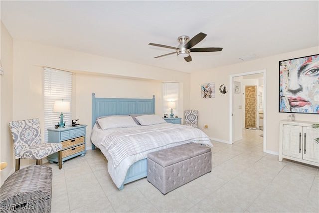 25379 Paladin Ln, Punta Gorda, FL 33983 - bedroom with light tile patterned flooring, a ceiling fan, and baseboards