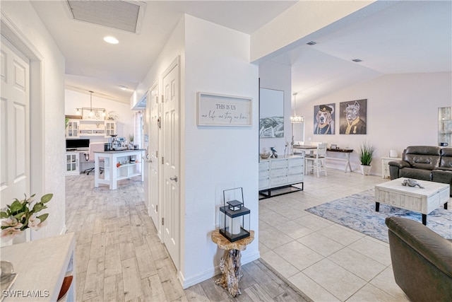 25379 Paladin Ln, Punta Gorda, FL 33983 - hallway featuring vaulted ceiling and recessed lighting