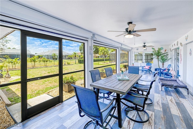 25379 Paladin Ln, Punta Gorda, FL 33983 - sunroom featuring healthy amount of natural light, a ceiling fan, and outdoor dining area