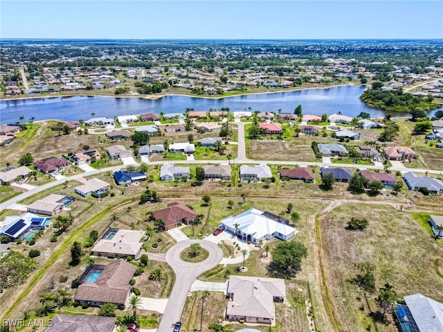 25379 Paladin Ln, Punta Gorda, FL 33983 - aerial view of property and surrounding area with a large body of water and nearby suburban area