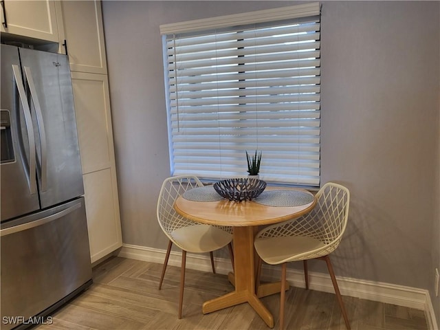 11460 Caravel Cir Unit 5016, Fort Myers, FL 33908 - dining space with baseboards