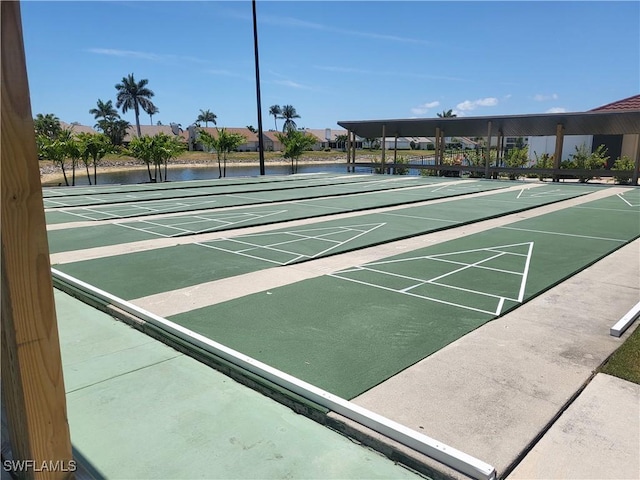11460 Caravel Cir Unit 5016, Fort Myers, FL 33908 - view of property's community with shuffleboard and a water view