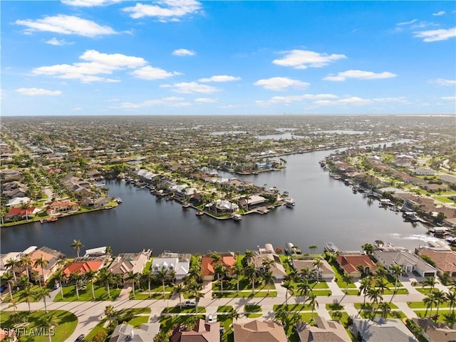 1069 SW 57th St, Cape Coral, FL 33914 - aerial perspective of suburban area featuring a nearby body of water
