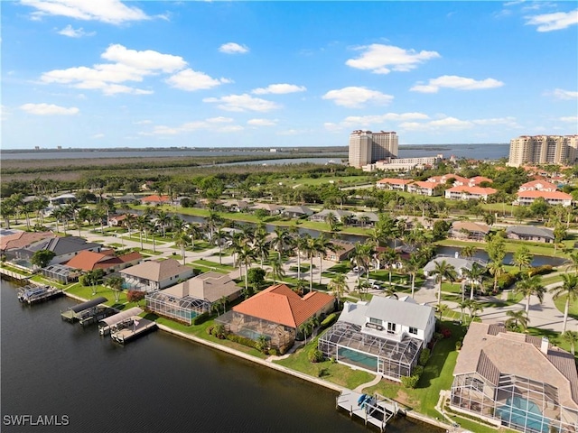 1069 SW 57th St, Cape Coral, FL 33914 - aerial perspective of suburban area featuring a large body of water