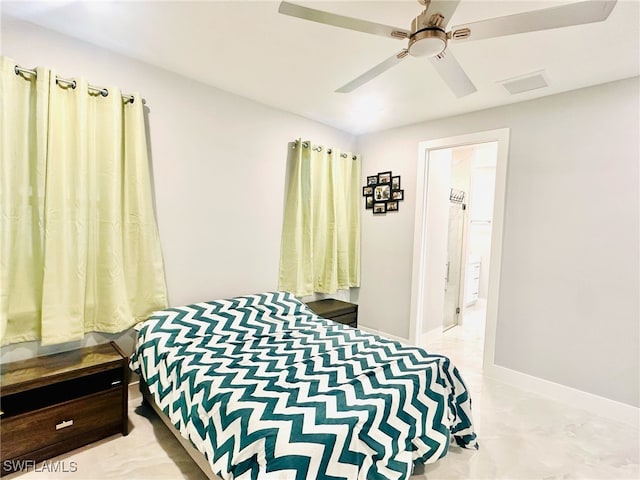 3016 6th St W, Lehigh Acres, FL 33971 - bedroom featuring baseboards and a ceiling fan