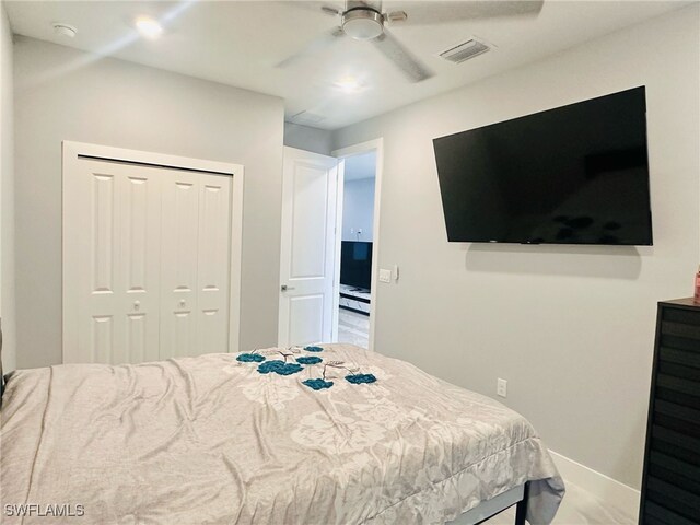 3016 6th St W, Lehigh Acres, FL 33971 - bedroom featuring a closet, baseboards, and ceiling fan