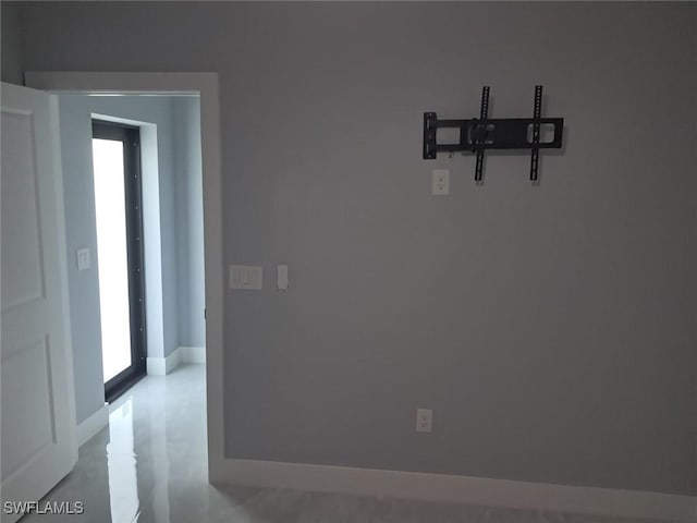 3016 6th St W, Lehigh Acres, FL 33971 - spare room with plenty of natural light and baseboards