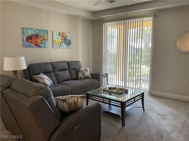 1516 SW 50th St Unit 104, Cape Coral, FL 33914 - carpeted living room with baseboards and ceiling fan