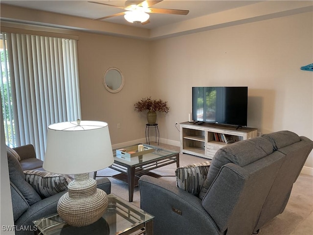 1516 SW 50th St Unit 104, Cape Coral, FL 33914 - living area with ceiling fan, light carpet, and baseboards