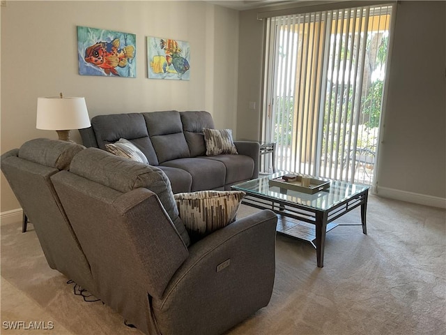 1516 SW 50th St Unit 104, Cape Coral, FL 33914 - living area with baseboards and light carpet