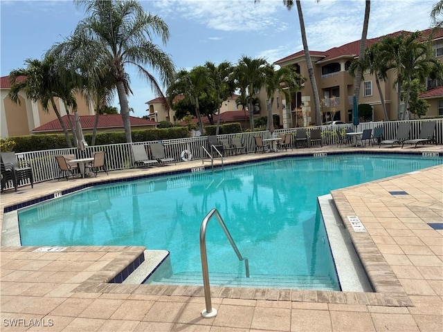 1516 SW 50th St Unit 104, Cape Coral, FL 33914 - community pool featuring a patio area