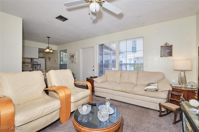 3350 Alouette Cir Unit 1, Fort Myers, FL 33907 - carpeted living area with a ceiling fan