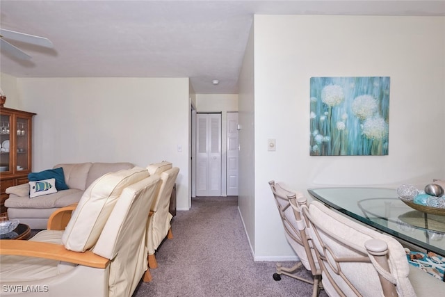 3350 Alouette Cir Unit 1, Fort Myers, FL 33907 - living area featuring carpet, ceiling fan, and baseboards