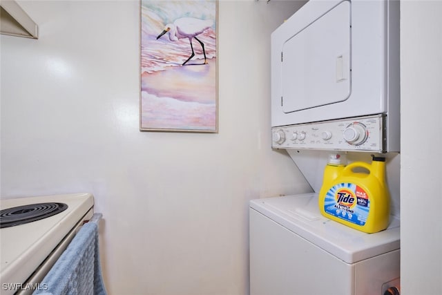 3350 Alouette Cir Unit 1, Fort Myers, FL 33907 - laundry area featuring stacked washer / dryer