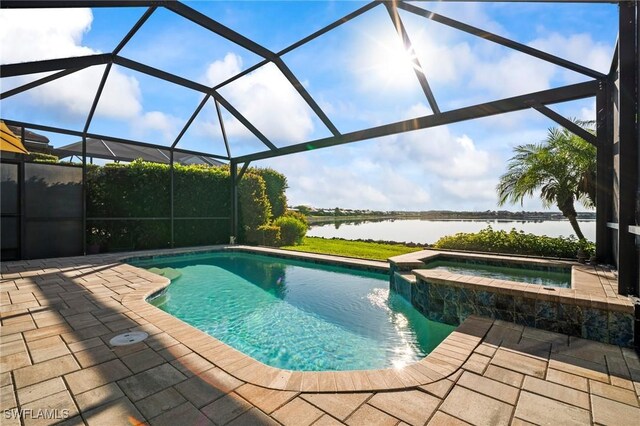 20245 Corkscrew Shores Blvd, Estero, FL 33928 - view of swimming pool with a water view, a patio, a pool with connected hot tub, and glass enclosure