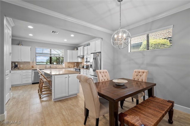 20245 Corkscrew Shores Blvd, Estero, FL 33928 - dining area featuring crown molding, a chandelier, and recessed lighting