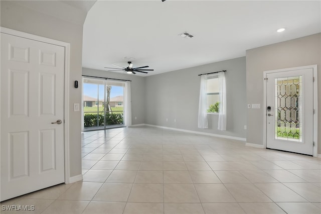 2810 Blossom Way, Naples, FL 34120 - empty room with ceiling fan, baseboards, light tile patterned floors, and recessed lighting