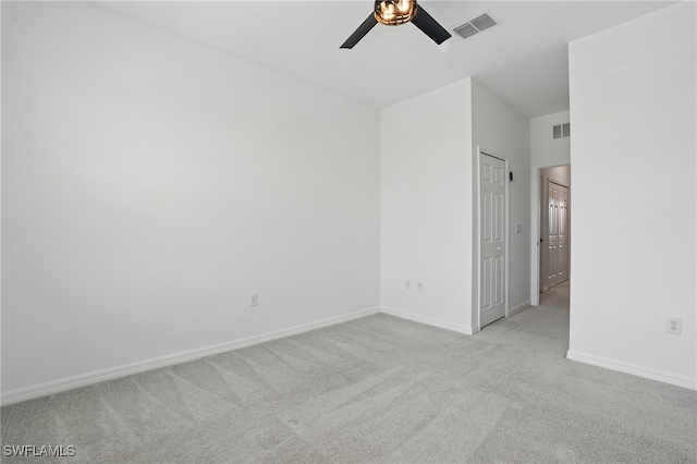 2810 Blossom Way, Naples, FL 34120 - unfurnished bedroom featuring carpet, baseboards, and ceiling fan