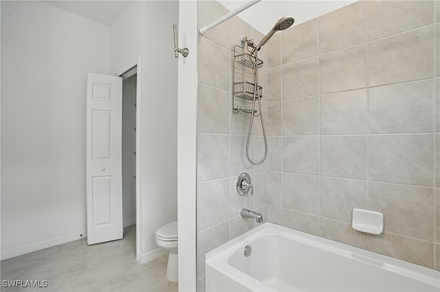 2810 Blossom Way, Naples, FL 34120 - full bathroom with toilet, bathtub / shower combination, baseboards, and tile patterned floors