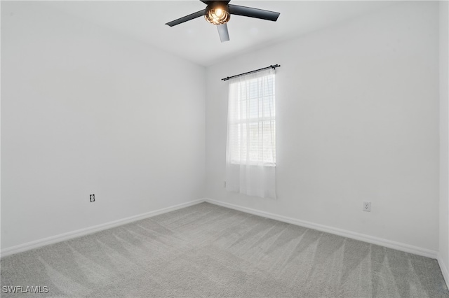 2810 Blossom Way, Naples, FL 34120 - unfurnished room featuring carpet, a ceiling fan, and baseboards