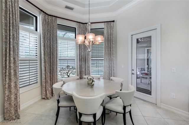6419 Vivaldi Ct, Naples, FL 34113 - dining space featuring a chandelier, light tile patterned flooring, crown molding, and baseboards