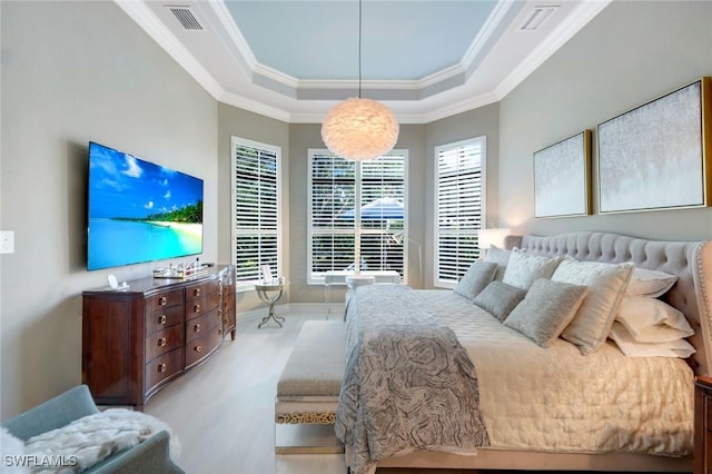 6419 Vivaldi Ct, Naples, FL 34113 - bedroom with a tray ceiling, crown molding, baseboards, and wood finished floors